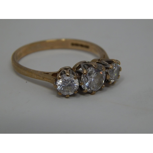 215 - 9ct Gold Gemset Trilogy Ring. 987871