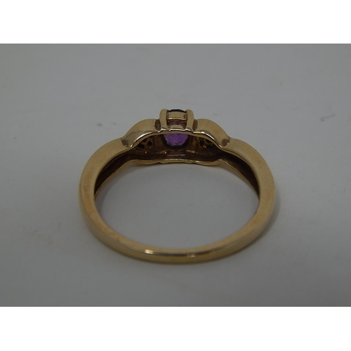 222 - 9ct gold diamond and amethyst set ring. 292359