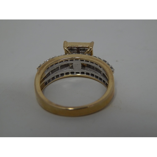 235 - 9ct gold diamond set ring. 440975