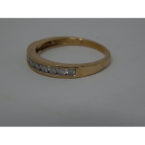 240 - 9ct gold diamond set half eternity ring. 299223