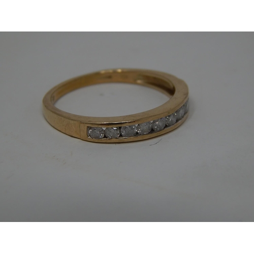 240 - 9ct gold diamond set half eternity ring. 299223