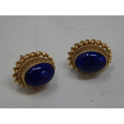 245 - 9ct gold lapis set studs. 219459