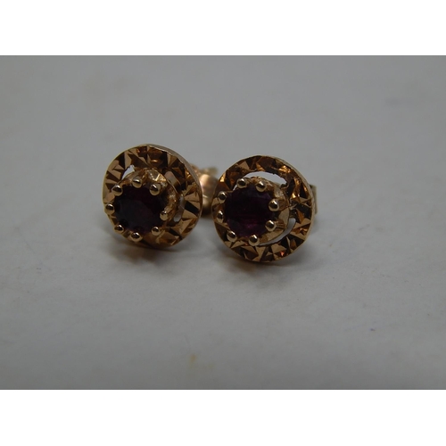 246 - 9ct gold garnet set stud earrings. 280303