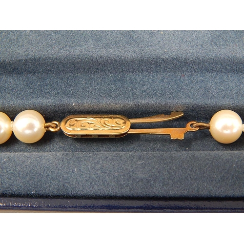 248 - 9ct gold clasped faux pearl necklace. 138998