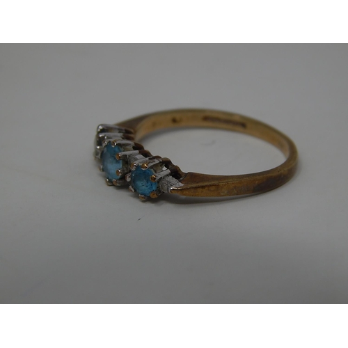 250 - 9ct gold diamond and topaz set ring. 336876