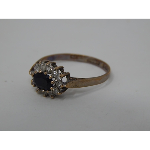 251 - 9ct gold gemstone set cluster ring. 972456