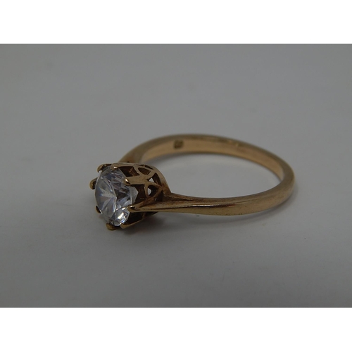 253 - 9ct gold gemstone set solitaire ring. 869052