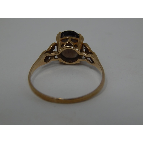 255 - 9ct gold smoky quartz set ring. 637669