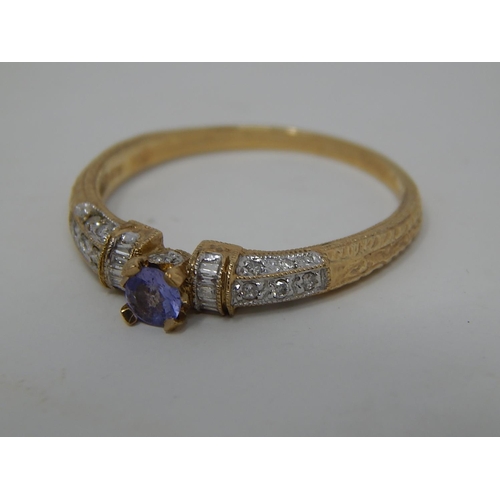 256 - 9ct gold diamond and gemstone set ring. 598229