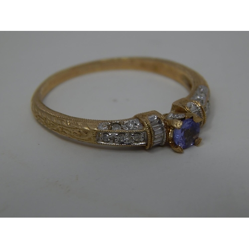 256 - 9ct gold diamond and gemstone set ring. 598229