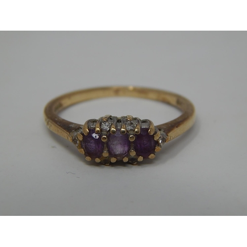 276 - 9ct gold amethyst and diamond set dress ring. 390467