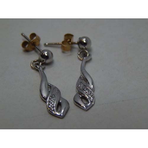 279 - 9ct gold diamond set drop earrings. 694486