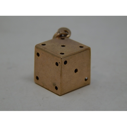 280 - 9ct gold dice charm. 974029