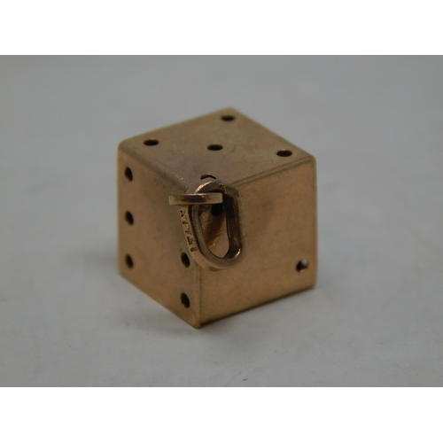 280 - 9ct gold dice charm. 974029