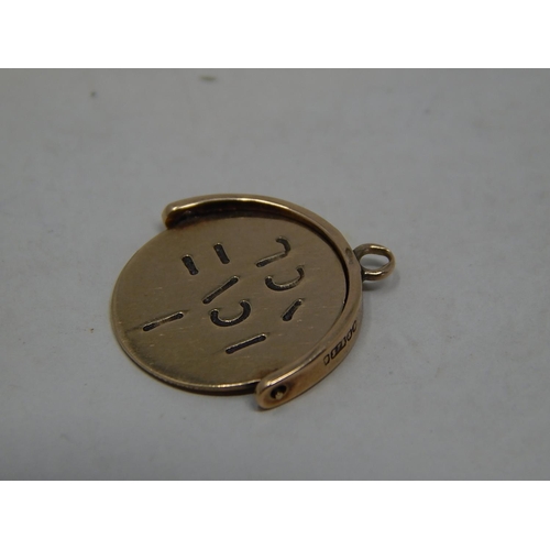 281 - 9ct gold spinner charm. 906712