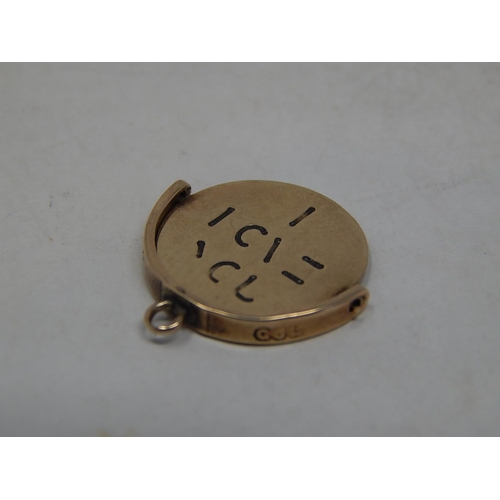 281 - 9ct gold spinner charm. 906712