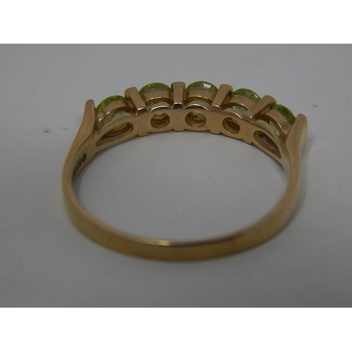 282 - 9ct gold peridot set half eternity ring. 359880