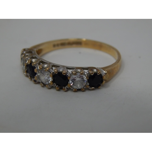 283 - 9ct gold gemstone set half eternity ring. 933327