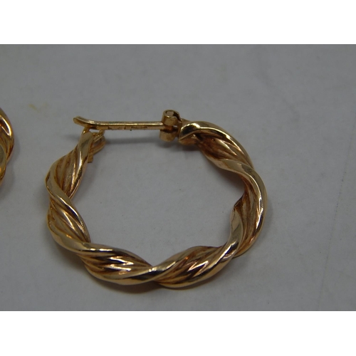 285 - 9ct gold twist creole hoop earrings. 254160