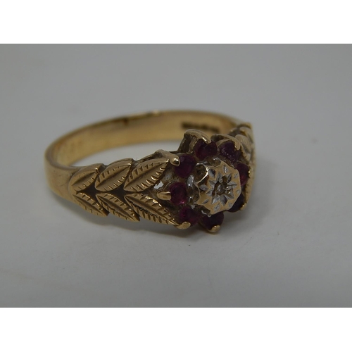 286 - 9ct gold ruby and diamond set cluster ring. 246524