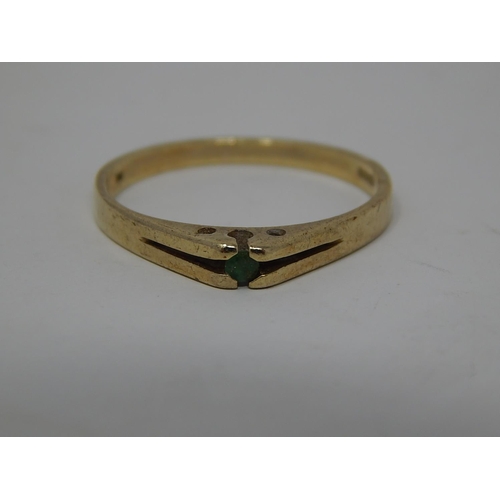 288 - 9ct gold emerald set dress ring. 543982