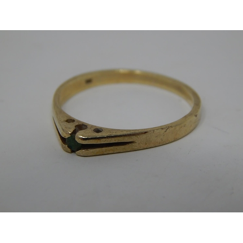 288 - 9ct gold emerald set dress ring. 543982