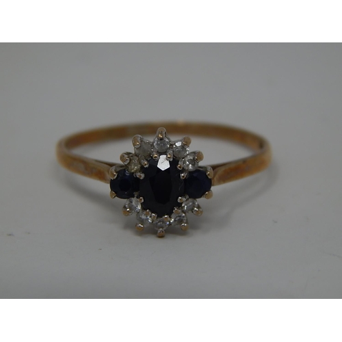 289 - 9ct gold gemstone set cluster ring. 869352