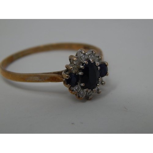 289 - 9ct gold gemstone set cluster ring. 869352