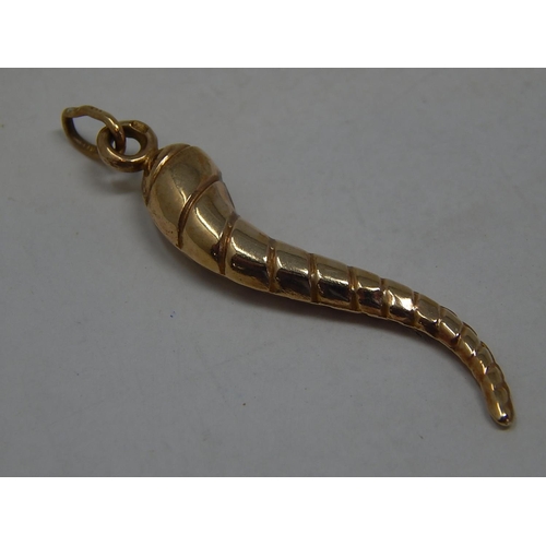 296 - 9ct gold horn of plenty charm. 926657