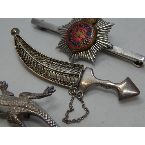 93 - 2 x Silver Brooches together with a silver military brooch.