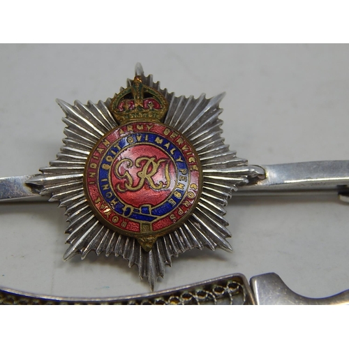 93 - 2 x Silver Brooches together with a silver military brooch.