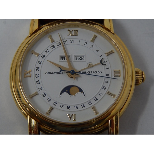 180A - MAURICE LACROIX: 18ct Gold Gentleman's wristwatch, automatic, lever movement, caliber ETA 2824-2, bl... 