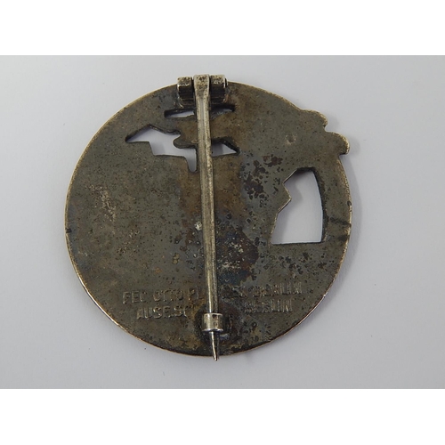 520 - WWII Nazi Blockade Runner Badge: FEC. OTTO PLANCZEK. BERLIN: Measures 4.7cm diameter