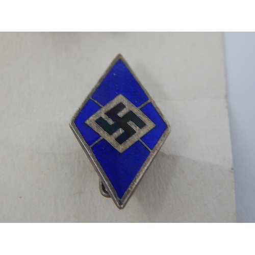 521 - WWII: 2 x Hitler Youth Badges Including Blue Marine Version.