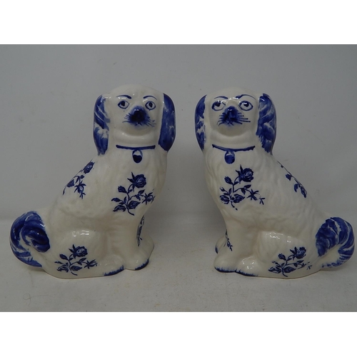 565 - Pair of Blue & White Staffordshire Dogs: Measuring 21cm high