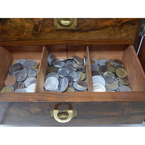 32 - A wooden 3-drawer collectors cabinet full of coinage of the World all unsorted/unchecked