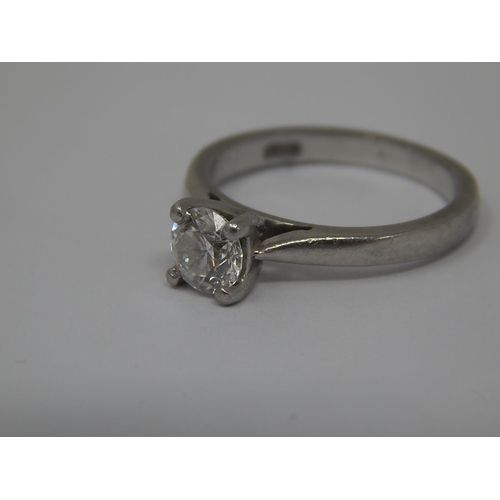 46 - Platinum Diamond Solitaire Ring: The Round Brilliant Cut Diamond: Colour D, Clarity SI 1: Diamond 0.... 