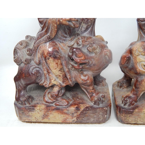 502 - Pair of Oriental Soapstone Figures on Temple Dogs: Height 22cm