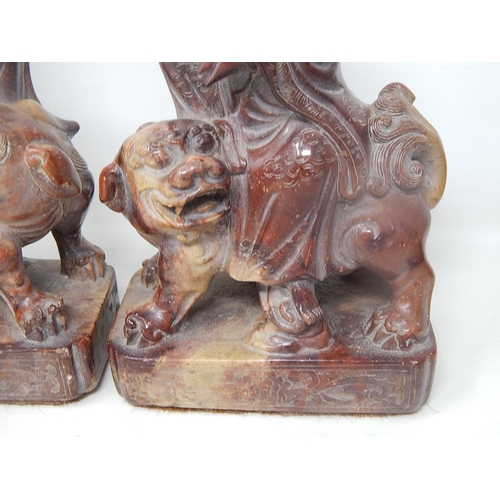 502 - Pair of Oriental Soapstone Figures on Temple Dogs: Height 22cm