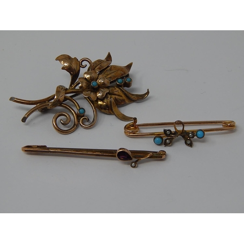 77 - 9ct Bar Brooch  set with a teardrop garnet & a seed pearl together with a turquoise set floral spray... 