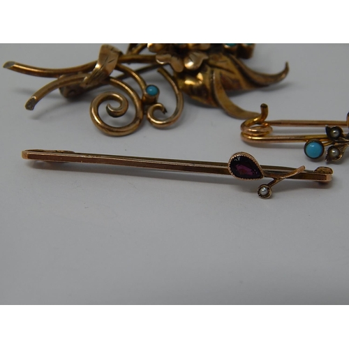 77 - 9ct Bar Brooch  set with a teardrop garnet & a seed pearl together with a turquoise set floral spray... 