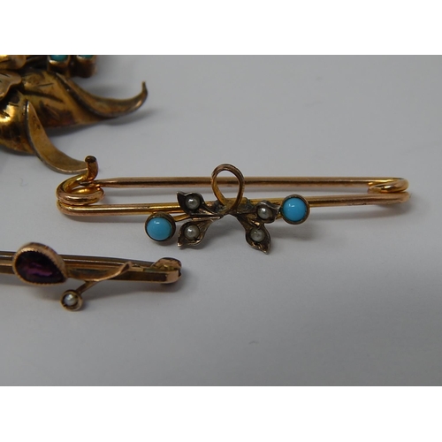 77 - 9ct Bar Brooch  set with a teardrop garnet & a seed pearl together with a turquoise set floral spray... 