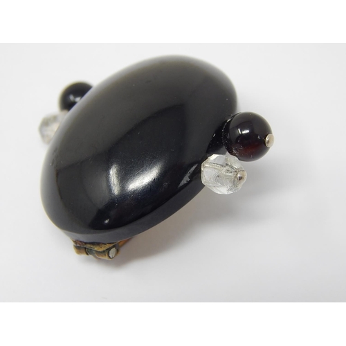 91 - Art Deco Black Oval Brooch Mounted with Faceted Clear & Black Stones to Each Side.