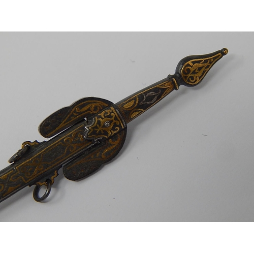 94 - A Toledo Sword Brooch with Pique Decoration. 8.5cm