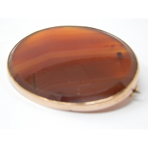 106 - Victorian Orange Banded Agate Brooch in 9ct Gold Mount.