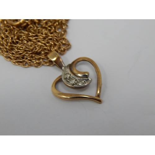 135 - 9ct gold diamond heart pendant necklace. 310899