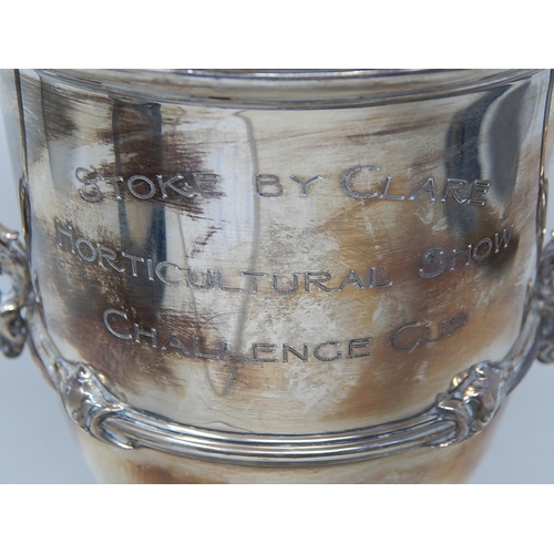 122 - Silver Trophy Cup & Lid on Stand: Hallmarked London 1923 by Goldsmiths & Silversmiths: Height 29cm: ... 