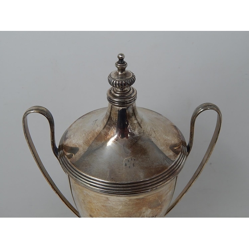 123 - Silver Trophy Cup & Lid on Stand: Hallmarked London 1921 by Goldsmiths & Silversmiths: Height 31cm: ... 