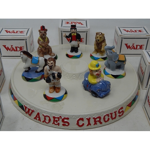 639 - WADE'S CIRCUS: Stand Complete with Seven Boxed Circus Figures.