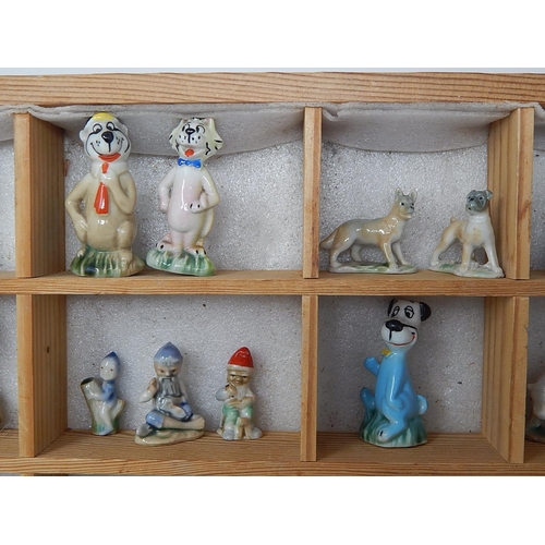 651 - Wooden Display Cabinet Containing a Quantity of Wade Figures etc (lot)